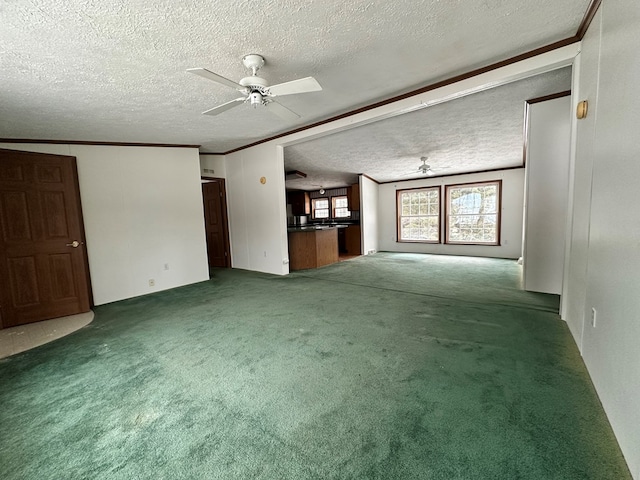 unfurnished living room featuring carpet, ceiling fan, and a textured ceiling