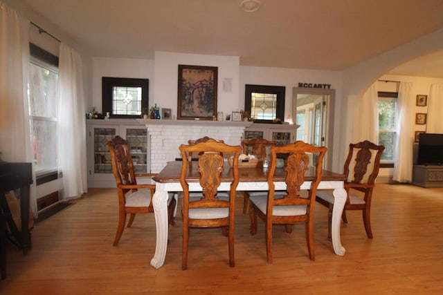 dining area with light hardwood / wood-style floors