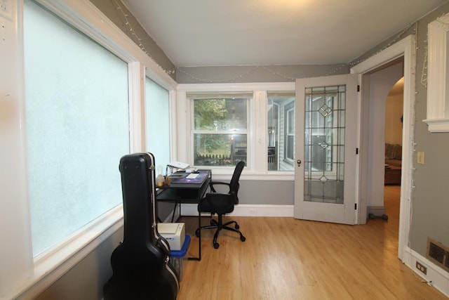 home office featuring light hardwood / wood-style floors