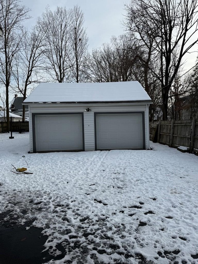 view of snow covered garage