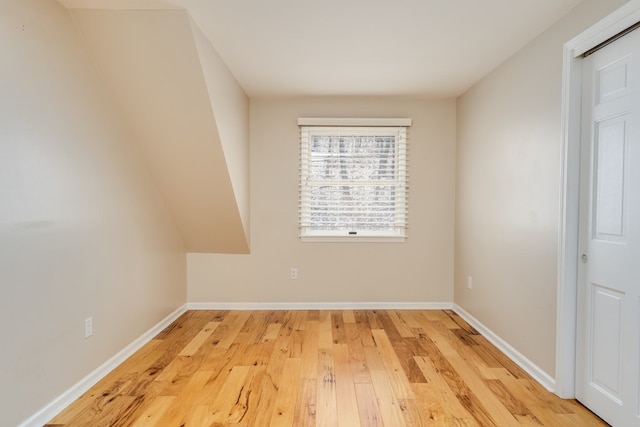 spare room featuring light hardwood / wood-style floors