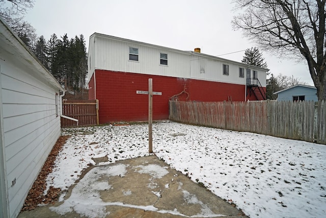 view of snow covered property