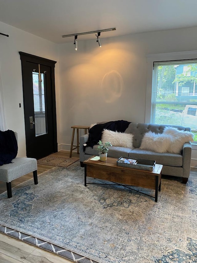 living room featuring track lighting