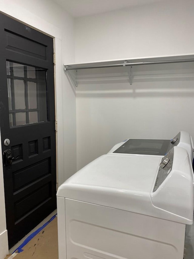 laundry room featuring independent washer and dryer