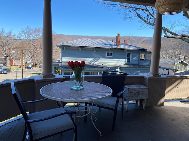 view of patio with a mountain view and a porch