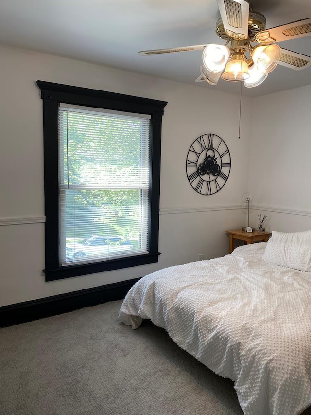 bedroom featuring carpet and ceiling fan