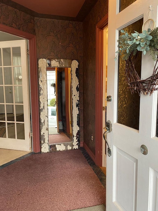 hallway featuring carpet floors