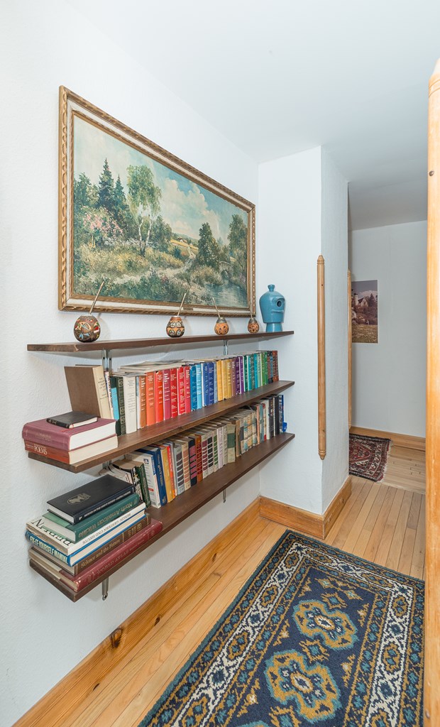 hallway featuring hardwood / wood-style floors