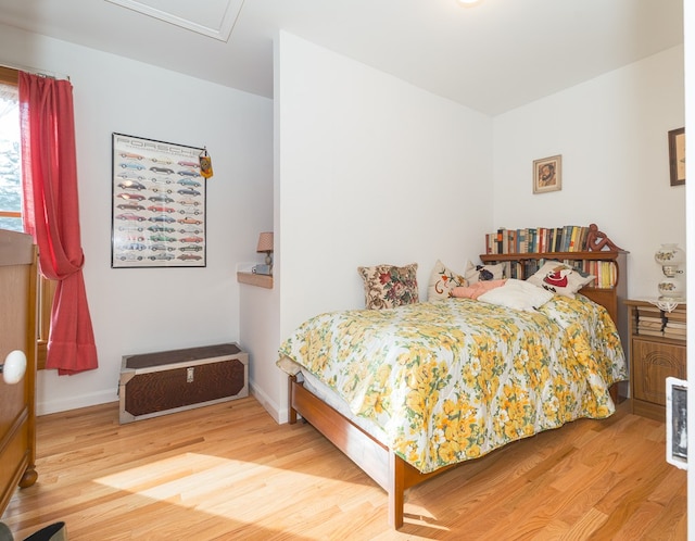 bedroom featuring hardwood / wood-style flooring