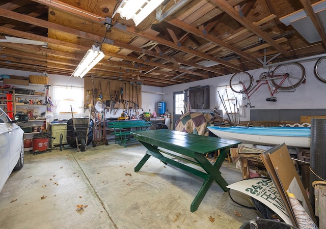 garage with a workshop area