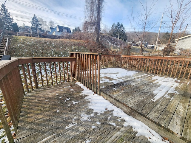 view of snow covered deck