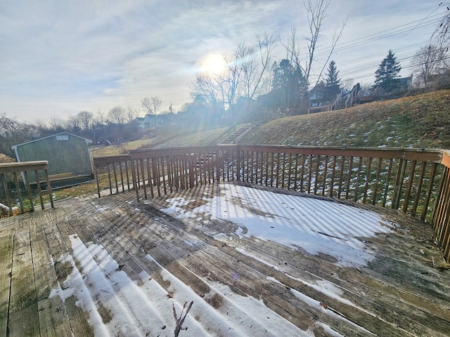 deck featuring a storage shed