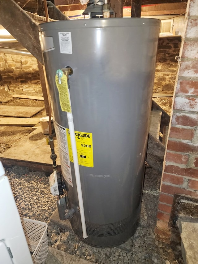 utility room featuring gas water heater