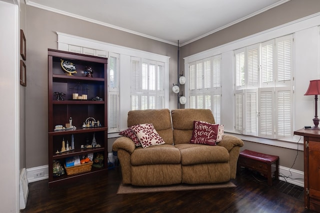 living room with crown molding and dark hardwood / wood-style floors