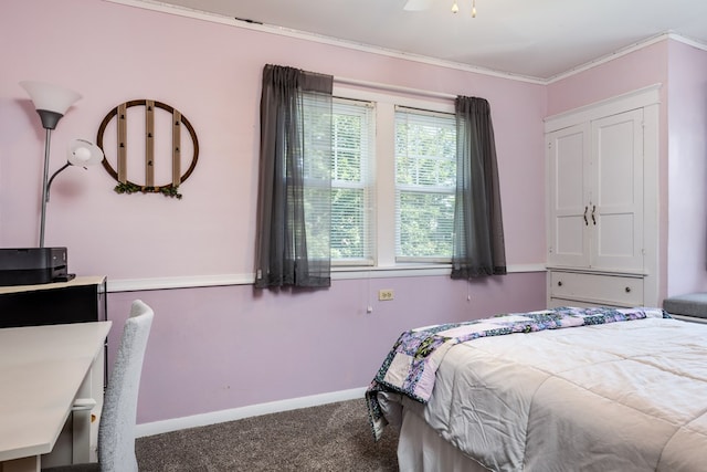 bedroom featuring multiple windows, ceiling fan, carpet, and crown molding