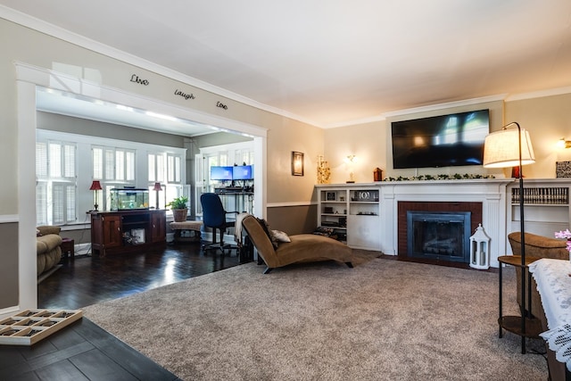 living room featuring hardwood / wood-style floors and crown molding