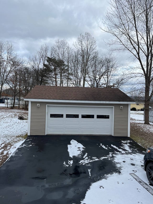 view of snow covered garage