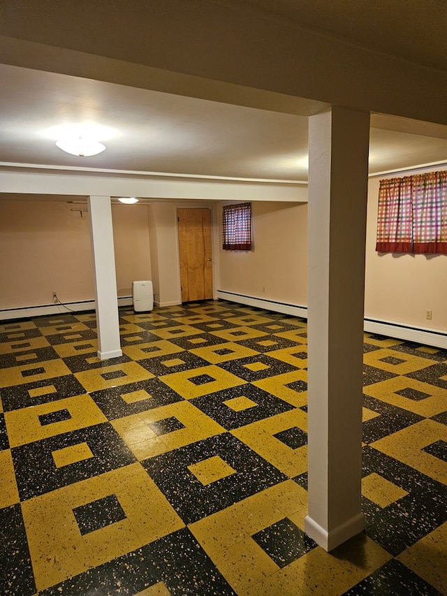 basement featuring baseboard heating