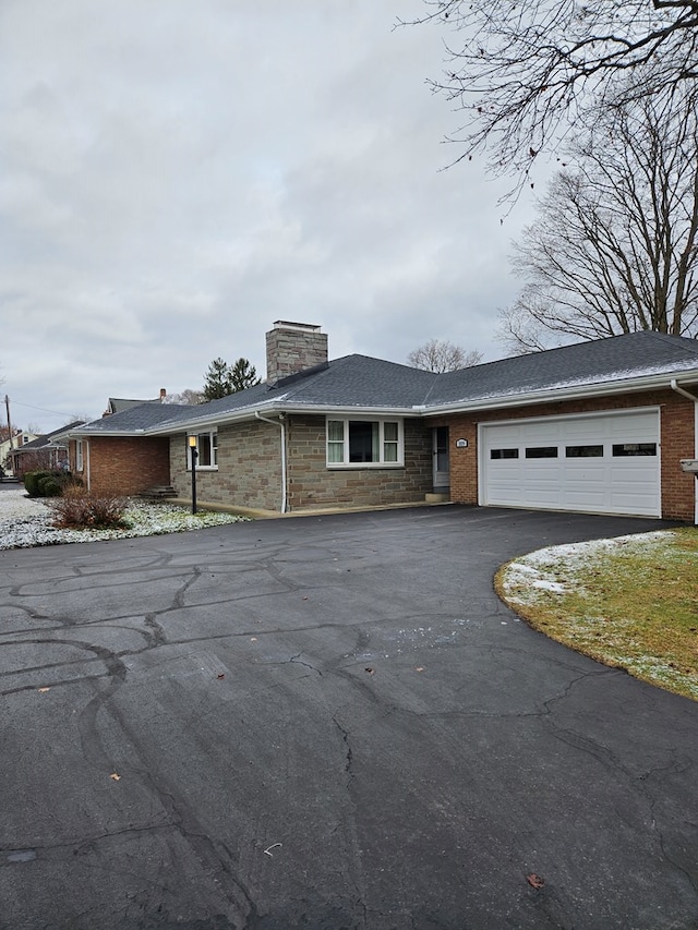 view of front of house with a garage