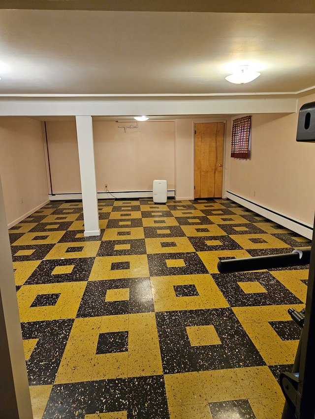 basement featuring a baseboard radiator