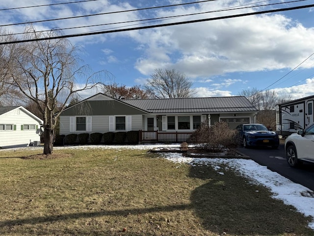 view of front of home featuring a front lawn and a porch