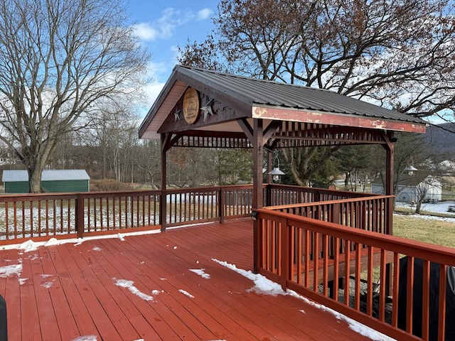 snow covered deck with a gazebo