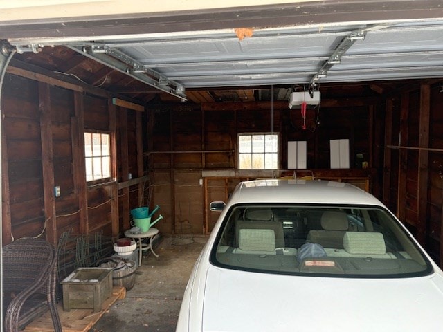 garage featuring a garage door opener