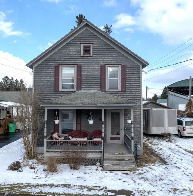 view of property with a porch