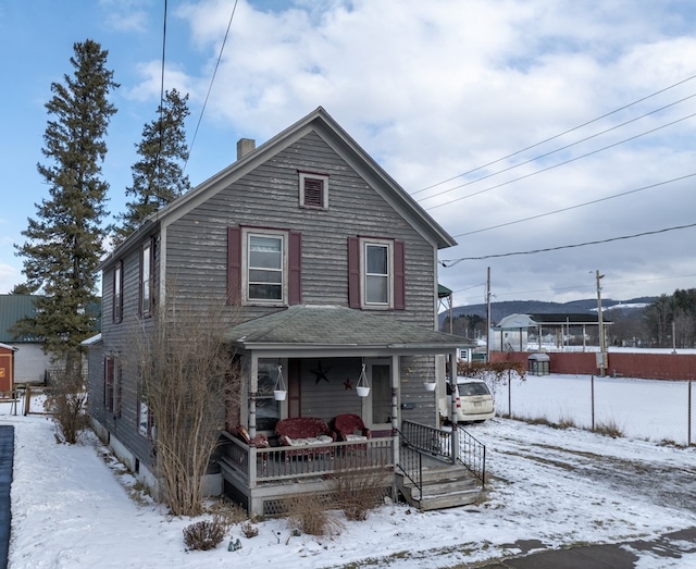 front of property featuring a porch