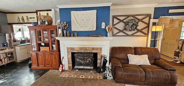 living room with a fireplace, a textured ceiling, and crown molding