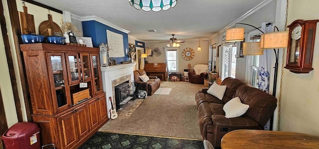 carpeted living room featuring ceiling fan and ornamental molding