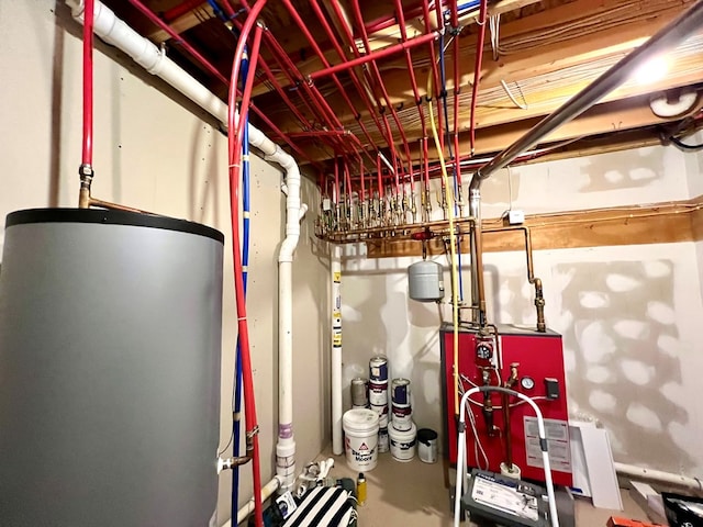 utility room featuring gas water heater