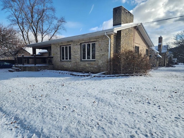 view of snow covered property