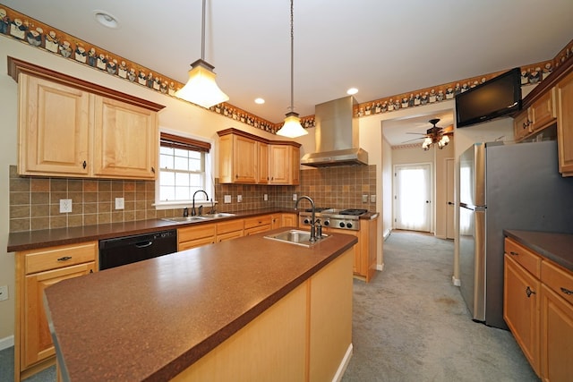 kitchen featuring pendant lighting, appliances with stainless steel finishes, sink, island range hood, and a center island with sink