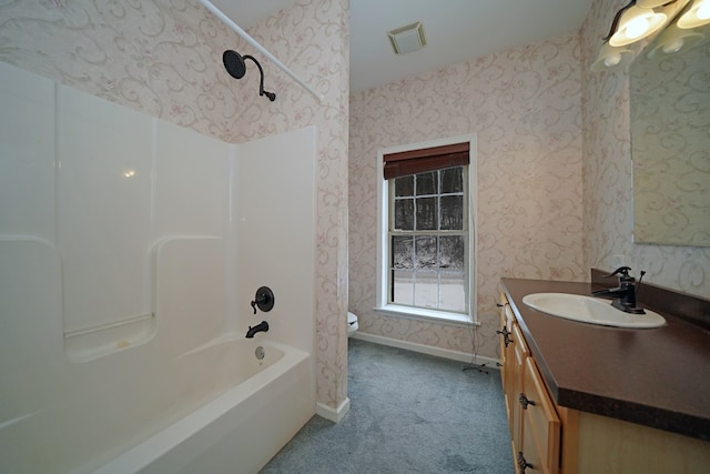 full bathroom with toilet, shower / bathing tub combination, and vanity