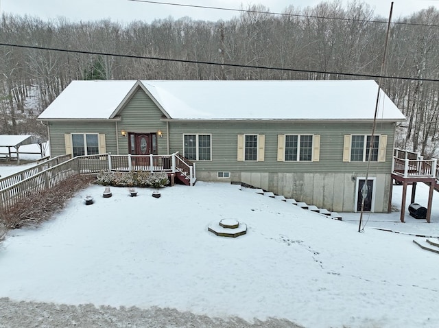 view of front of home with a wooden deck