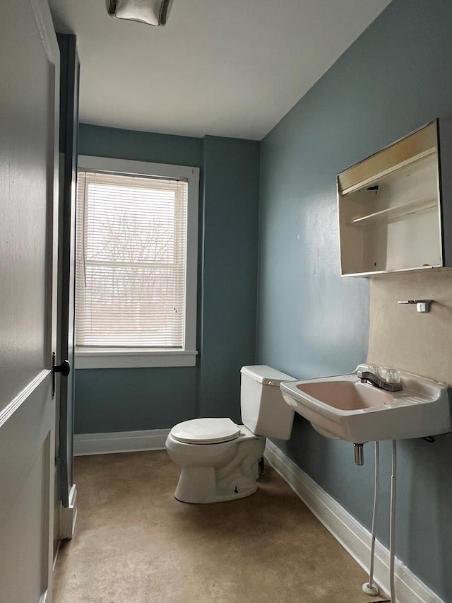 bathroom with sink and toilet