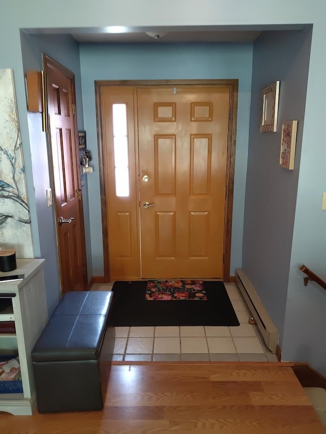 entryway featuring baseboard heating