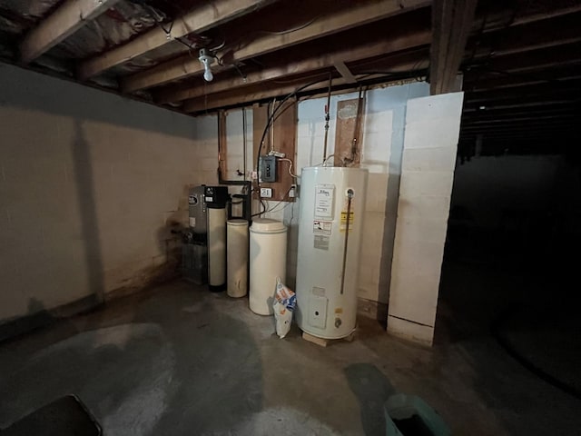 utility room with electric water heater