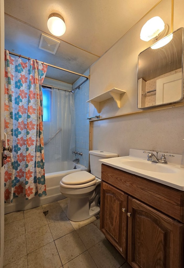 full bathroom with shower / bath combination with curtain, tile patterned floors, vanity, and toilet