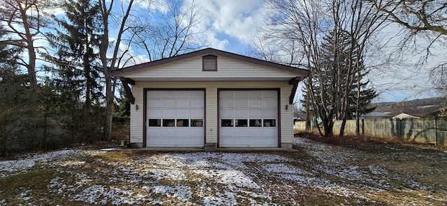 view of snow covered garage