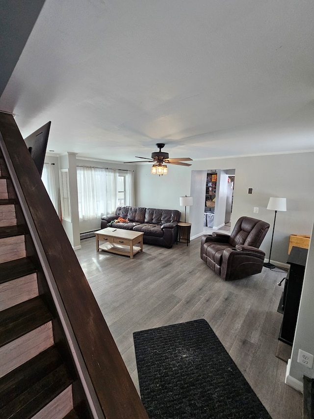 living room with hardwood / wood-style floors and ceiling fan