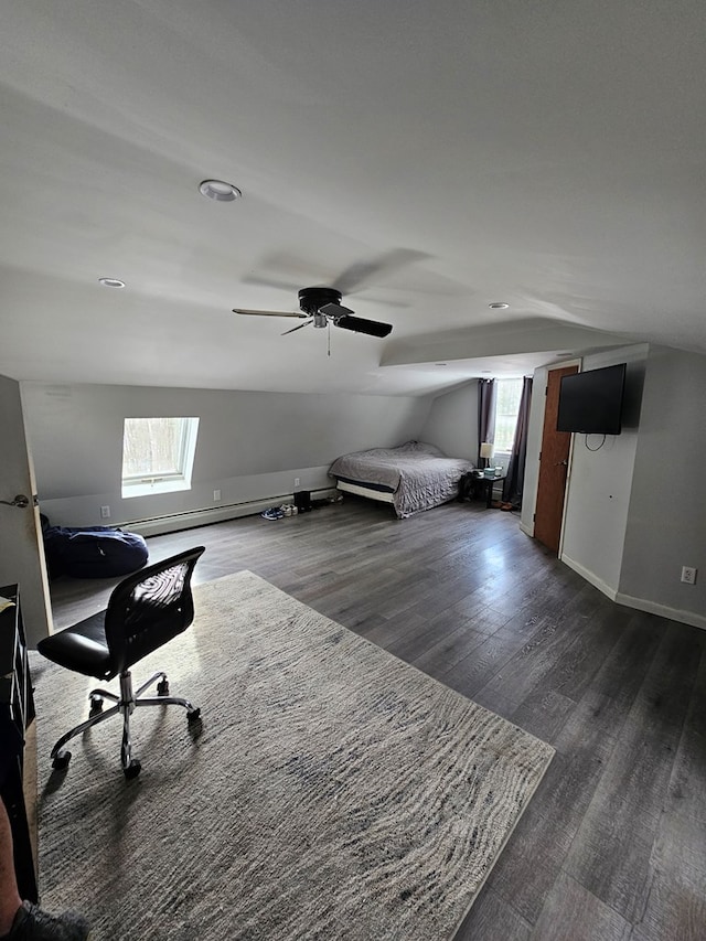 bedroom featuring ceiling fan, dark hardwood / wood-style floors, and vaulted ceiling