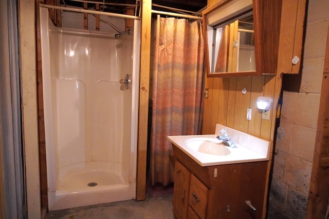 bathroom featuring vanity and a shower with shower curtain