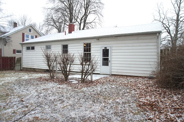 view of snow covered property