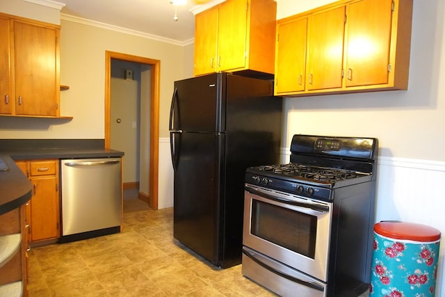 kitchen with ornamental molding and stainless steel appliances