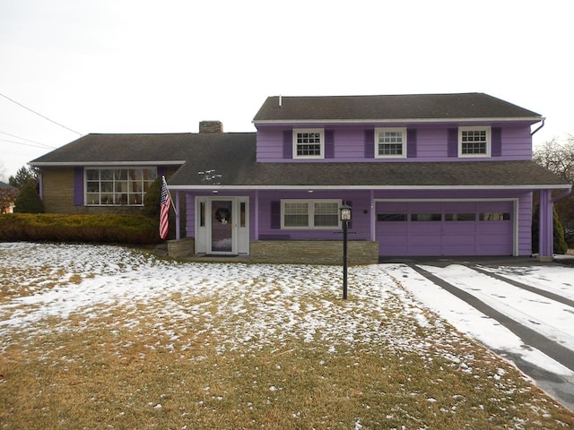 view of front of house featuring a garage