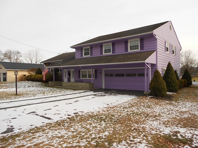 view of property with a garage