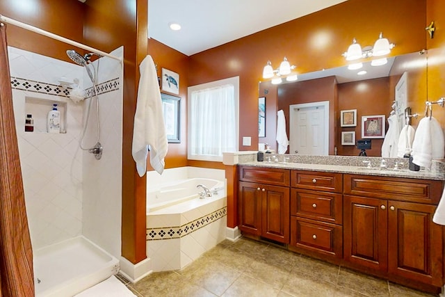 bathroom with vanity and plus walk in shower