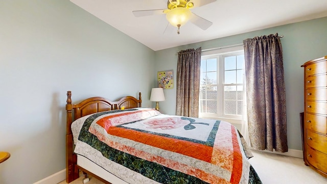 bedroom with ceiling fan and carpet